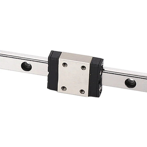 Heavy Duty Linear Motion Guide Rail And Bearing Block System For Precise Transmission Control In CNC Machines And Injection Equipment, Rugged Bearing Steel Construction Delivers Smooth, Reliable Performance close-up on rail and block.