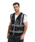 Rock Solid 9 Pocket Reflective Safety Vest Designed To Handle The Daily Construction Grind With Spacious Zippered Stash Bins Heavy Duty Utility Wear For Men And Women, shown on a model, featuring multiple pockets.