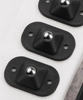 Slick Self Adhesive Mini Swivel Casters With 360 Spin For Kitchen Appliances And Furniture solid ABS glide pucks in close-up.