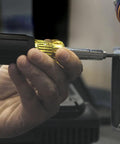 Hand using Double Ended Replacement Tap For Klein Tools Multi Bit Tap Tool Replacement in metal threading application