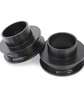 Heavy Duty 1.75 Inch Leveling Kit For Dodge Ram 2500 And 3500 4WD Trucks front coil spacers in black steel design.