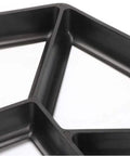 Close-up of black 30x30 cm paving mold, part of Two Pack Concrete Slab Moulds For DIY Path Building Irregular Stone Look Pavement Bricks 30x30 Cm.