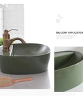 Rock Solid Black Ceramic Bathroom Sink With Square Above Counter Setup Featuring A Super Smooth Matte Glaze Finish Built Tough For Daily Washdowns And Absolute Zero Hassle Cleaning Tailored For Modern Households shown with bronze faucet.