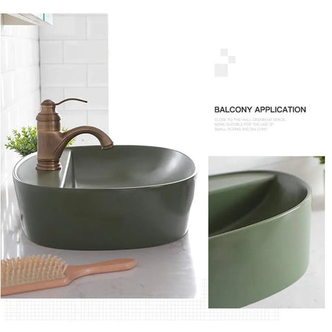 Rock Solid Black Ceramic Bathroom Sink With Square Above Counter Setup Featuring A Super Smooth Matte Glaze Finish Built Tough For Daily Washdowns And Absolute Zero Hassle Cleaning Tailored For Modern Households shown with bronze faucet.