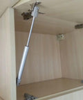 Two Pack 18 Lb Heavy Duty Hydraulic Gas Strut Lift Supports For Cabinets And Kitchen Cabinet Doors 80 N Load 7 Inch Closed Length 10 Inch Extended Satin Silver Mounting Plate Includes Screws And Manual installed on cabinet door
