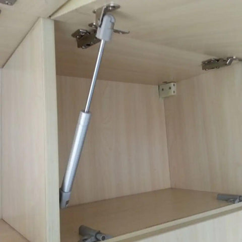Two Pack 18 Lb Heavy Duty Hydraulic Gas Strut Lift Supports For Cabinets And Kitchen Cabinet Doors 80 N Load 7 Inch Closed Length 10 Inch Extended Satin Silver Mounting Plate Includes Screws And Manual installed on cabinet door
