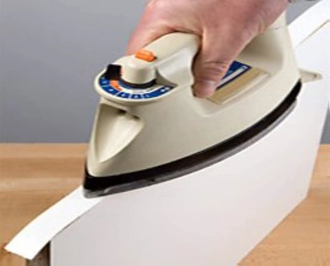 Applying White Melamine Edge Banding Roll 3/4 Inch By 25 Feet Pre Glued Flexible Iron On Edging For Cabinets with an iron