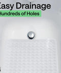 Premium Non Slip Bath Mat With Power Traction Suction Cups That Stay Locked For Stable Bathtub Floor Liner Featuring Rapid Moisture Escape Panels And No Fuss Cleanup Style In Crisp White Dimension Thirty Five By Sixteen showing easy drainage holes.