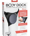 Kickass Adjustable Strap On Harness For Couples Heavy Duty Durable Comfort Fit With Easy Quick Release Buckles And Secure Waist Belt Top Shelf Adult Accessory packaging with suction cup design.
