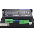 StepperOnline DM860T stepper motor driver, black box with blue DIP switch and green terminals for NEMA 34/42 motors