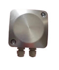 Electric proportional valve in square silver housing with circular central boss and two bottom ports (front view).