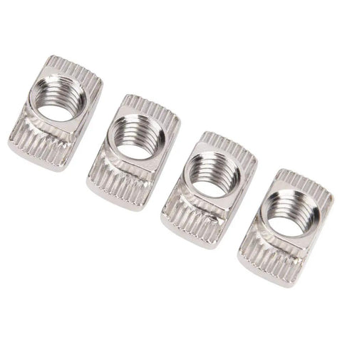 Four European Standard T Nut 45T M8 Threaded Sliding Nuts For Aluminum Profiles shown in close-up angle.