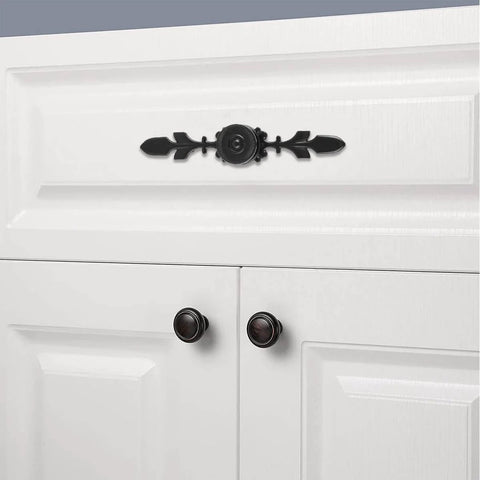 Vintage Style Zinc Alloy Pull Handle For Cabinets And Drawers Black 4 Pack With Screws Fits 18mm Thick Wood Ideal For Drawer Cabinet Furniture Remodel And Home Upgrades installed on white cabinet