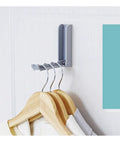 Slick Foldable Wall Hooks With Adhesive Backing For Space Saving No Drill Setup To Hang Jackets Purses Hats Or Dog Leashes In Foyer Closet Easy Install Design Works As A Lifesaver To Keep Home Clutter Free Always Two Pack with gray hooks holding wooden hangers.