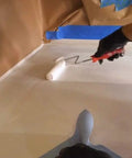 Person using Two Pack Pro Grade Quarter Inch Microfiber Roller Sleeves For Epoxy Resin And Painting No Shed Nap For Woodworking on surface