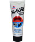 Sil-Glyde Lube Compound 8 oz tube with label for weatherproof and long-lasting use on gears, pins, and seals.