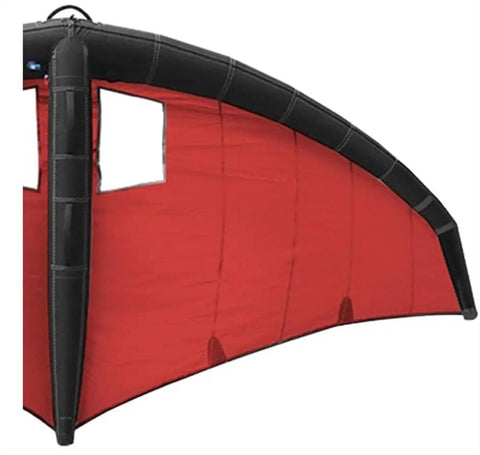 Side view of red inflatable Wind Wing Foil for Surfing and Kitesurfing with TPU canopy and nylon handle.