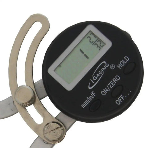 Close-up of Pro Grade Digital Caliper with Large LCD, showing inch/metric readings, chrome finish dial with friction lock feature.
