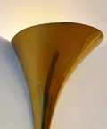 Curved Flared Metal Wall Sconce With Vintage Brushed Copper Iron Design Adds A Killer Upward Glow Perfect For Super Cozy Bedroom Reading And Chic Home Decor, showcasing the cone-shaped metallic shade.