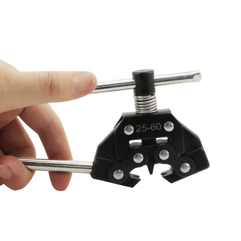 Hand holding a Breaker Cutter Tool For Motorcycle Roller Chain Detacher Fits 25 35 41 40 50 60 Links, high carbon steel
