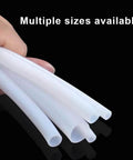 Hand holding multiple sizes of PTFE Teflon Tubing 6mm ID X 8mm OD White Translucent Hose for Bowden 3D Printer 3 Meters Long Dope Tubing