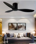 52 Inch Ceiling Fan With Remote Control Whisper Quiet Breeze Kick The Summer Heat American Style Decor For Home And Office Energy Saving Operation in black above a modern living room.