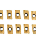 Front view of ten gold carbide milling inserts with central mounting holes