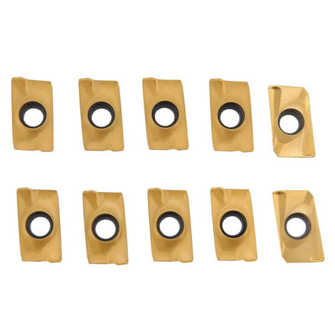 Front view of ten gold carbide milling inserts with central mounting holes