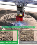 Creality Falcon 5W laser engraver head on metal rail; red housing with blue laser beam; 0.06×0.06mm spot size shown.