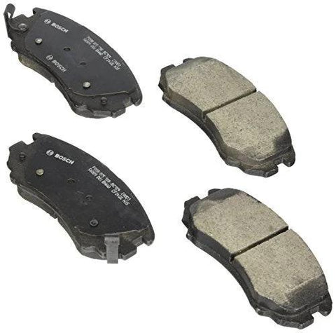 Bosch BC924 QuietCast ceramic brake pad set for front axle; four pads with black backing plates.
