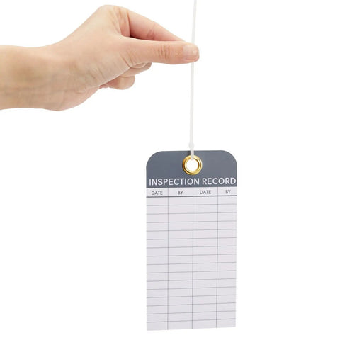 Hand holding Equipment Inspection Tags 24 Pack 6 by 3 Inches White PVC Waterproof and Rip-Resistant With Eyelets