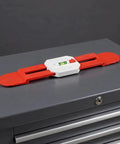 Adjustable Telescopic Spirit Level Ruler for Ac Installation, Red displayed on a tool cabinet with measuring bubble.