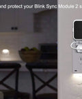 256GB USB Flash Drive With Outlet Wall Mount For Sync Module 2 in use on wall socket, enhancing space efficiency and camera system setup.