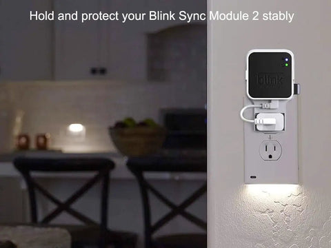 256GB USB Flash Drive With Outlet Wall Mount For Sync Module 2 in use on wall socket, enhancing space efficiency and camera system setup.