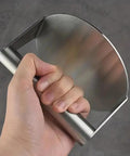 Person holding Hamburger Press For Smash Burgers, Stainless Steel Nonstick Smasher Patty Maker For Flat Top Griddle, Round 5.5 Inch