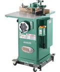 Built Like A Tank One Point Five Horsepower Woodworking Shaper Featuring Massive Twenty By Eighteen Inch Cast Iron Table And Dual Voltage Motor, side view.