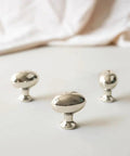 10 Pack Polished Nickel Oval Cabinet Knobs 35 Mm Zinc Drawer Knobs displayed on a white surface