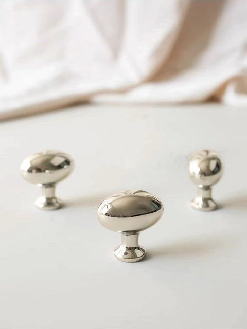 10 Pack Polished Nickel Oval Cabinet Knobs 35 Mm Zinc Drawer Knobs displayed on a white surface