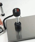 Heavy Duty Slick Digital Postal Scale With Crisp External Backlit Display showing a 3kg weight on a stainless steel platform.
