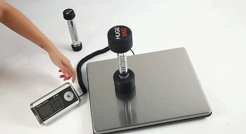 Solid Workhorse Digital Postal Scale Featuring Separate Lcd Screen And Heavy Gauge Steel Platform with weight on it