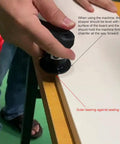 Heavy Duty Pneumatic Chamfering Tool With Six Blades And Four Bearings For Wood Metal Acrylic Deburring in use on a board edge.