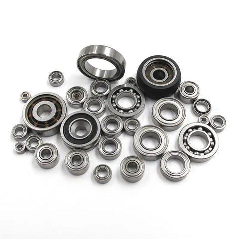 Assorted chrome steel ball bearings, visible are different sizes including 6304 Deep Groove Ball Bearing 20x52x15mm 2RS Double Shield.