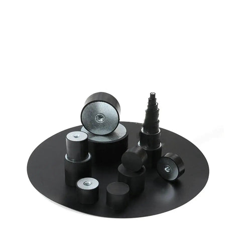 Pro Grade Rubber Shock Absorber Damper Mount Isolator Bobbin With Metric Female Side Thread For Boat And Car solid rubber mounts arranged on a black base.