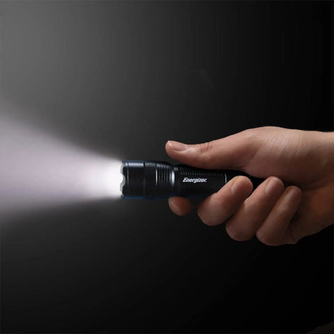 Heavy Duty Tactical LED Flashlight For EDC, Camping And Emergencies, Water Resistant Aluminum Body Torch in hand emitting light