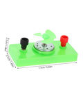 Mini Solar Powered Generator Motor For DIY Science Projects And STEM Kits on white background, green base, small propeller.