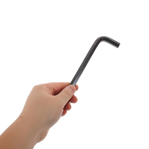 Hand holding Kick Ass Heavy Duty Metric Hex Wrench Set With Ball End Handles For Bike Fixing And Industrial Jobs Using High Carbon Steel To Crush Hand Fatigue During Tough Binds Plus Superior Wear Resistance.