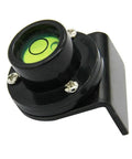 Close-up of a black bubble level for tower ruler, featuring green liquid vial and durable metal construction.