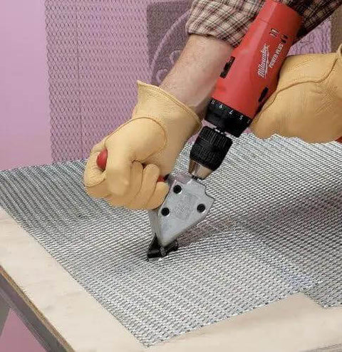 Turbo Sheet Metal Shear Attachment For Drills, 20 Gauge Capacity, Lightweight Aluminum Head in use on sheet metal with a red drill