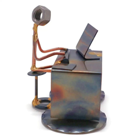 Handmade Metal Software Developer Figurine hand welded recycled metal art desk accessory side view at computer desk