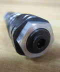 Close-up of Bosch Rexroth D620K2-12/100XYV Hydraulic Control Valve 3-1/2 Inch Long D620K212100XYV on wooden surface